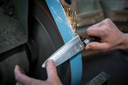 Sharpening service knife blade