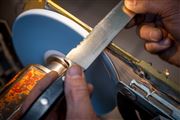 Sharpening service knife blade